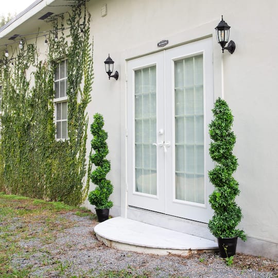5ft. UV-Resistant Boxwood Spiral Topiary Artificial Tree in Decorative Planter
